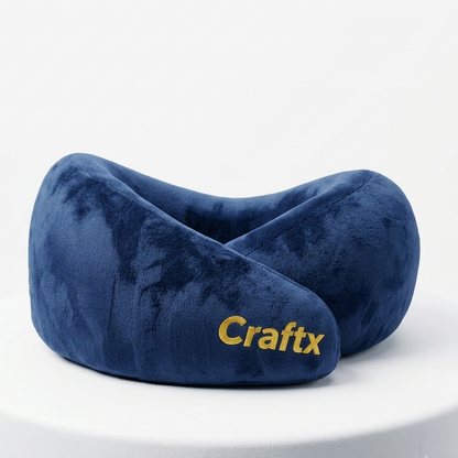 Craftx premium memory foam travel neck pillow used by a passenger in a luxury airplane cabin
